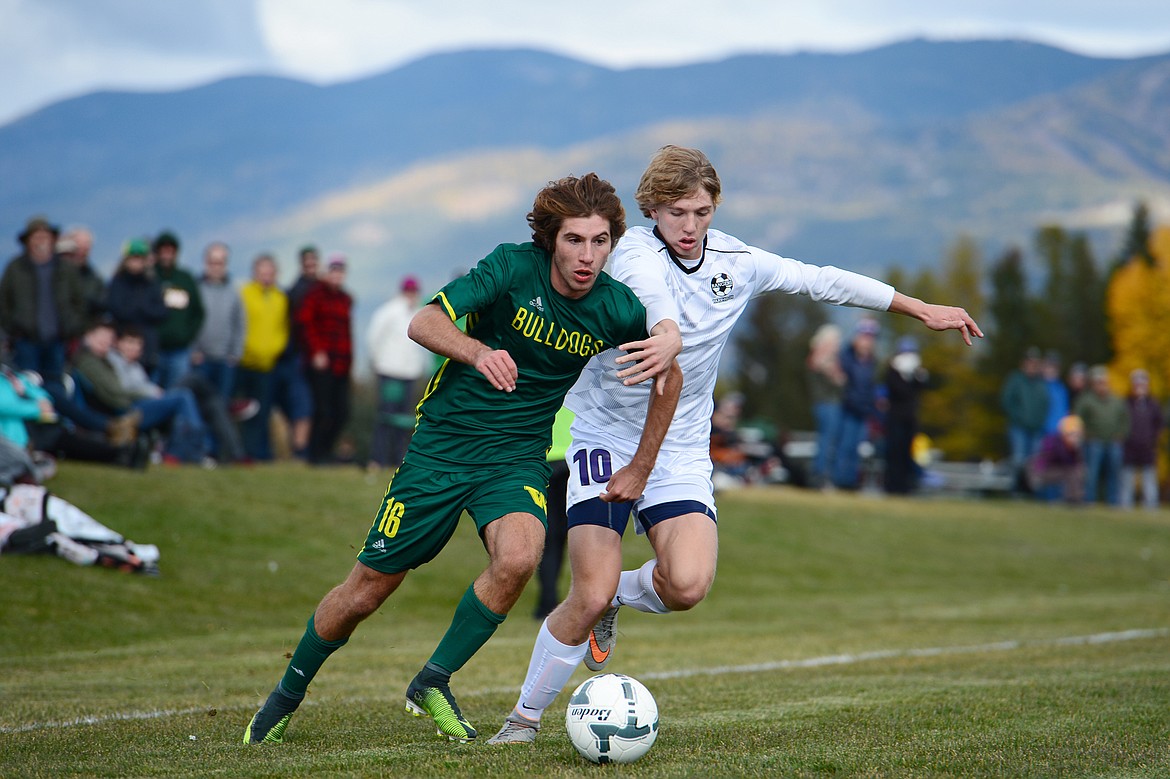 Whitefish's Xander Burger (16) dribbles around Livingston's Morgan Rosberg (10) in the second half at Smith Fields in Whitefish on Saturday. (Casey Kreider/Daily Inter Lake)