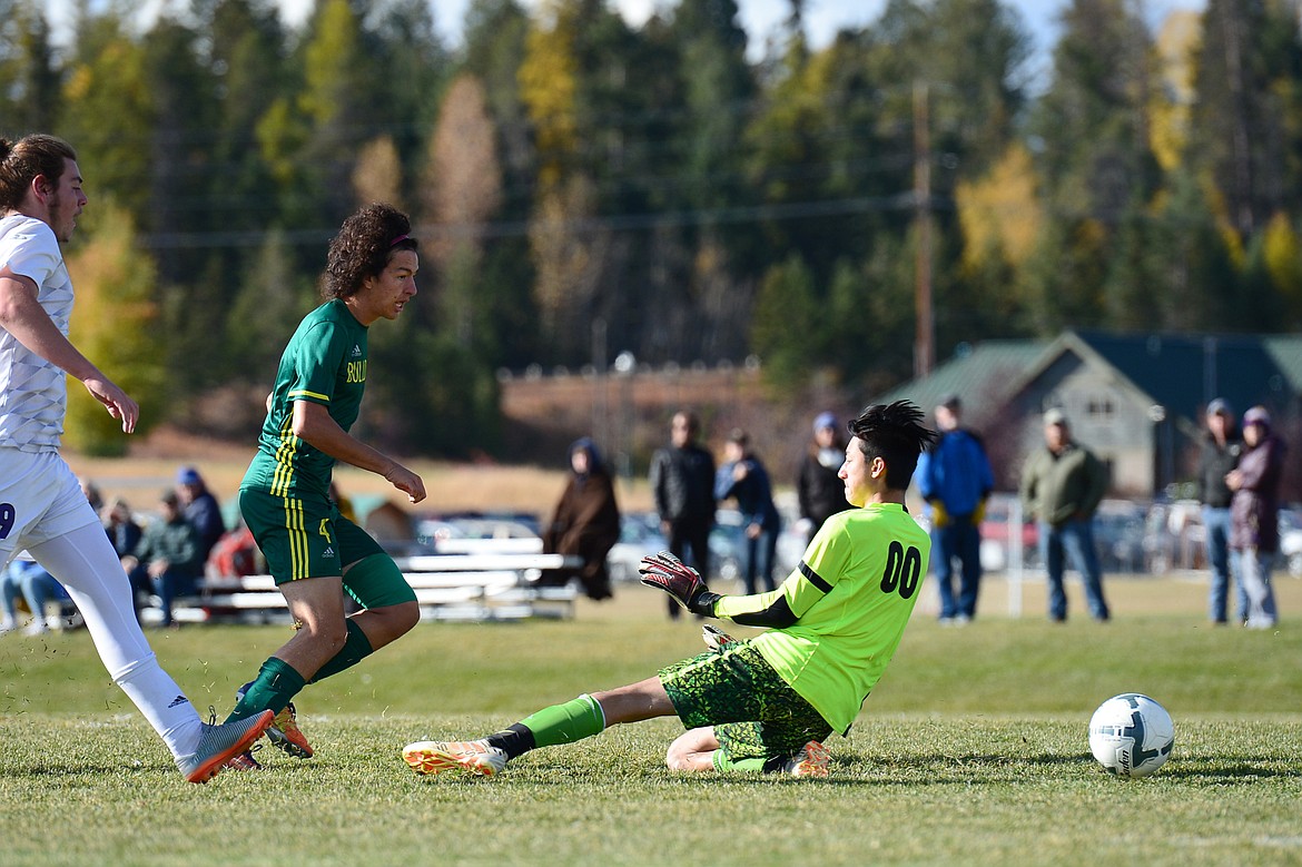 Whitefish's Ammann Koch-Ford (4) scores a goal in the first half against Livingston at Smith Fields in Whitefish on Saturday. (Casey Kreider/Daily Inter Lake)