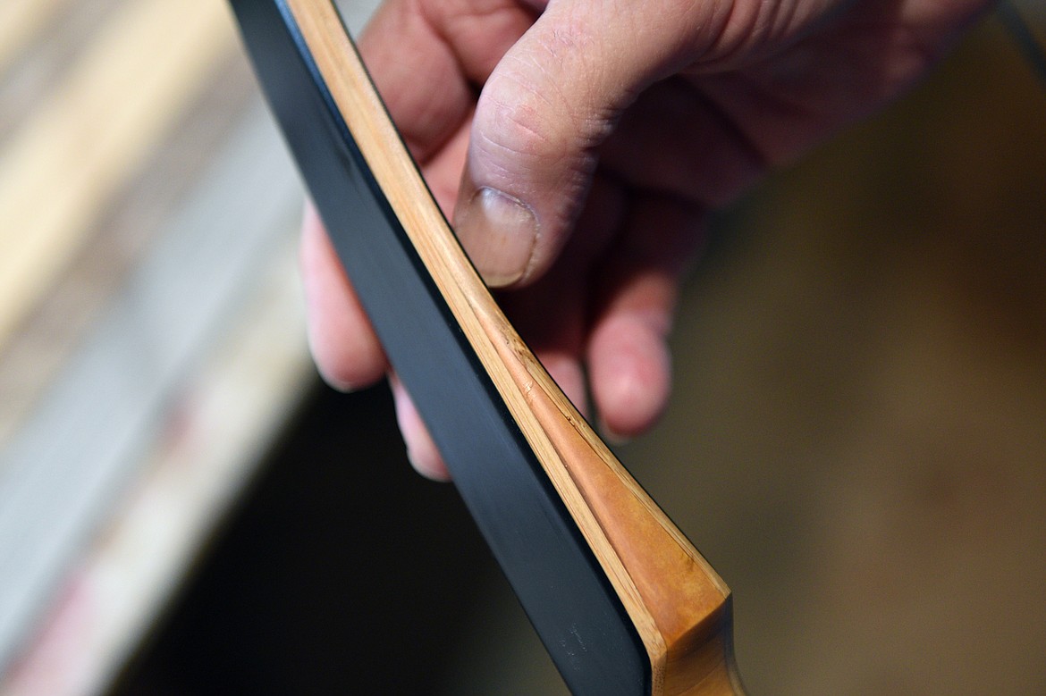 Detail of the upper limb of a bow made by Peter Laffin in his workshop in Eureka on Sept. 26. (Casey Kreider/Daily Inter Lake)