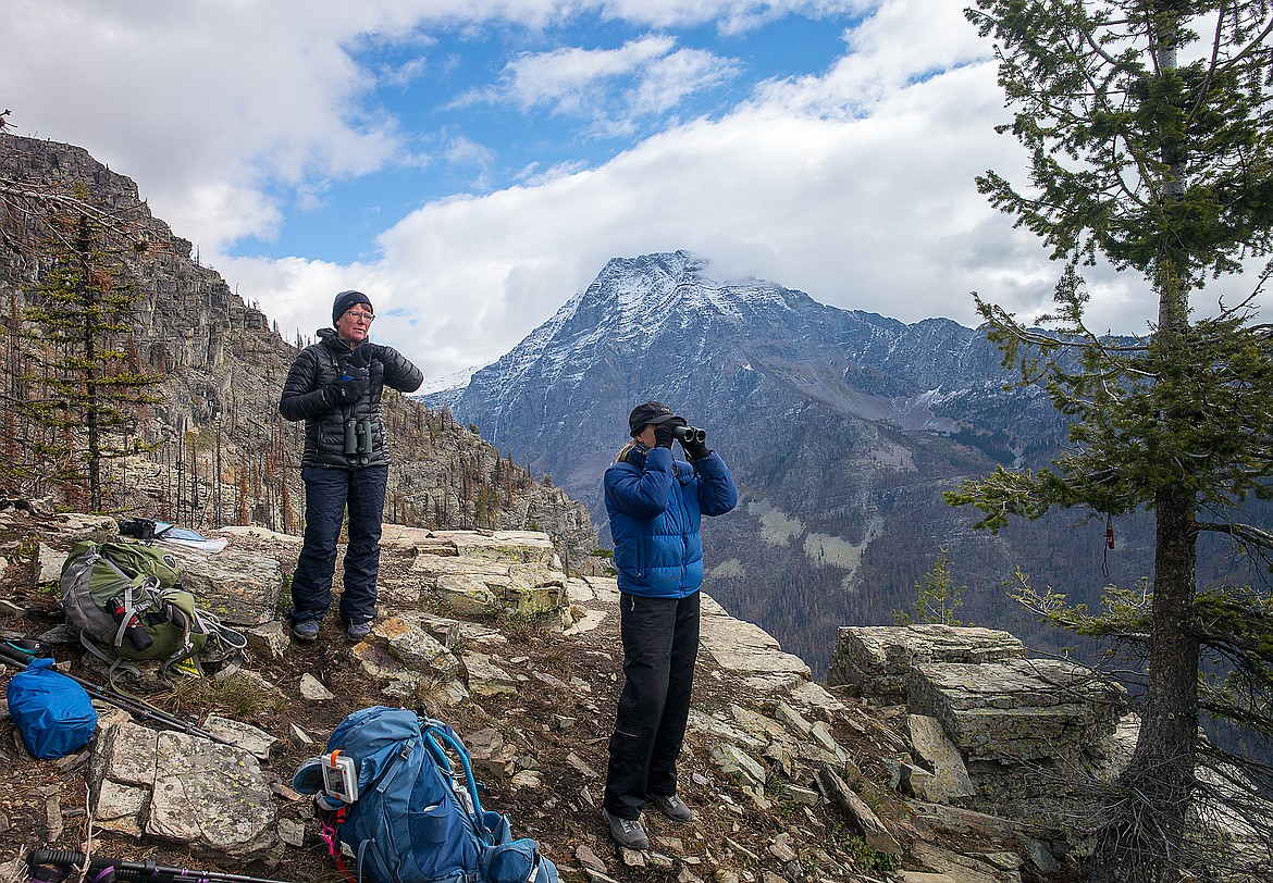 Lisa Bate, left, and Karen Chickering search for birds at the Mount Brown Hawk Watch site.