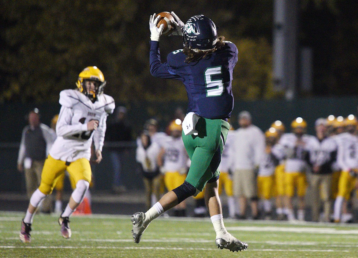 Glacier wide receiver Drew Deck (5) makes a fourth-quarter reception against Helena Capital at Legends Stadium on Friday. (Casey Kreider/Daily Inter Lake)