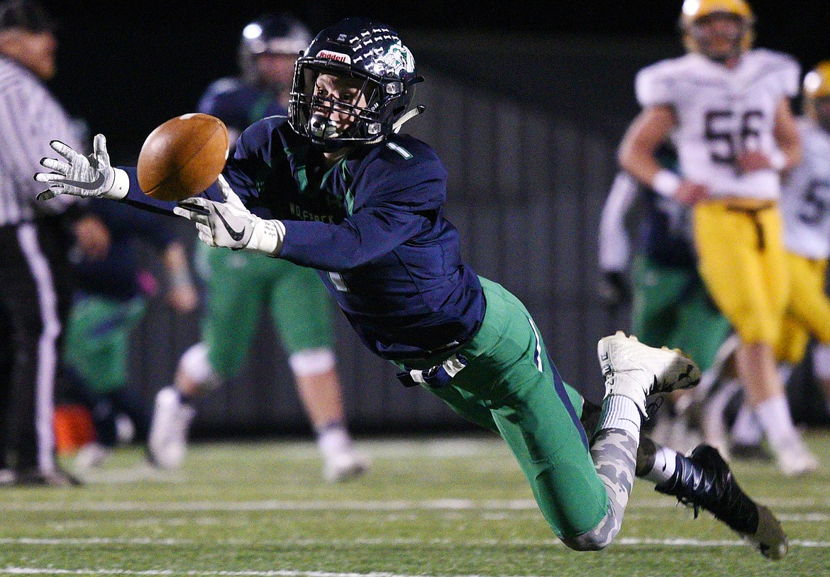 Glacier wide receiver Colin Bowden (1) can't reach a third-quarter pass from quarterback Evan Todd (2) against Helena Capital at Legends Stadium on Friday. (Casey Kreider/Daily Inter Lake)