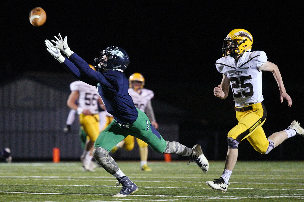 Glacier wide receiver Colin Bowden (1) can't reach a third-quarter pass from quarterback Evan Todd (2) against Helena Capital at Legends Stadium on Friday. (Casey Kreider/Daily Inter Lake)