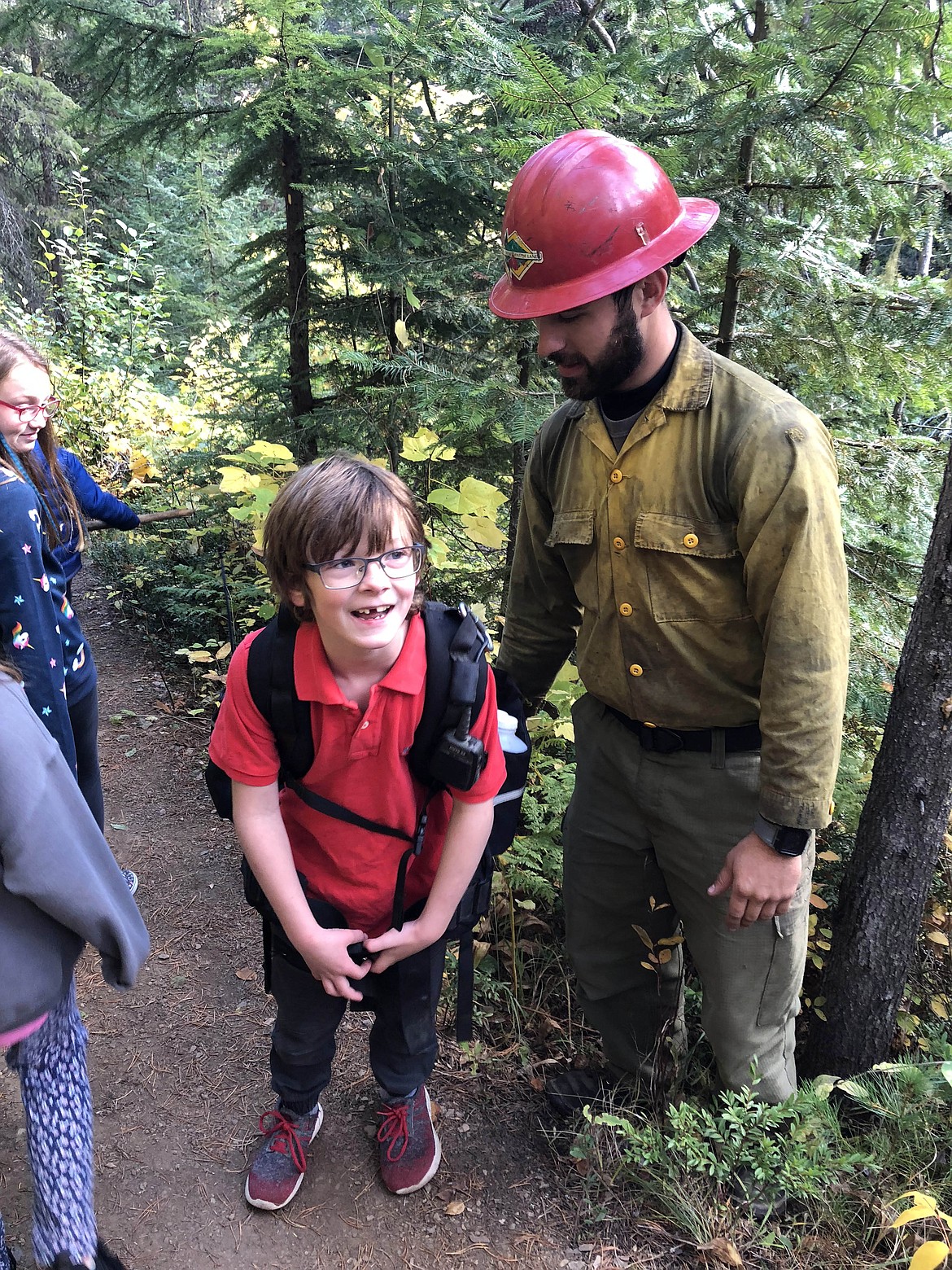 Courtesy photo
Students were able to try on a 35-pound firefighter pack during their hike on the Pulaski Tunnel Trail.