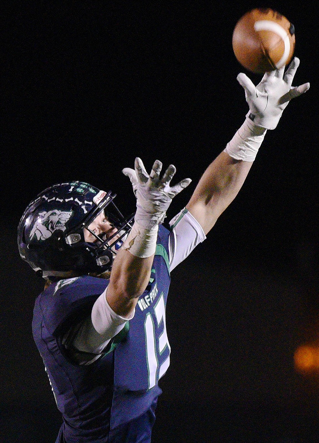 Glacier wide receiver Cole Crosby (13) can't get his hands on a pass from quarterback Evan Todd (2) in the fourth quarter against Helena Capital at Legends Stadium on Friday. (Casey Kreider/Daily Inter Lake)