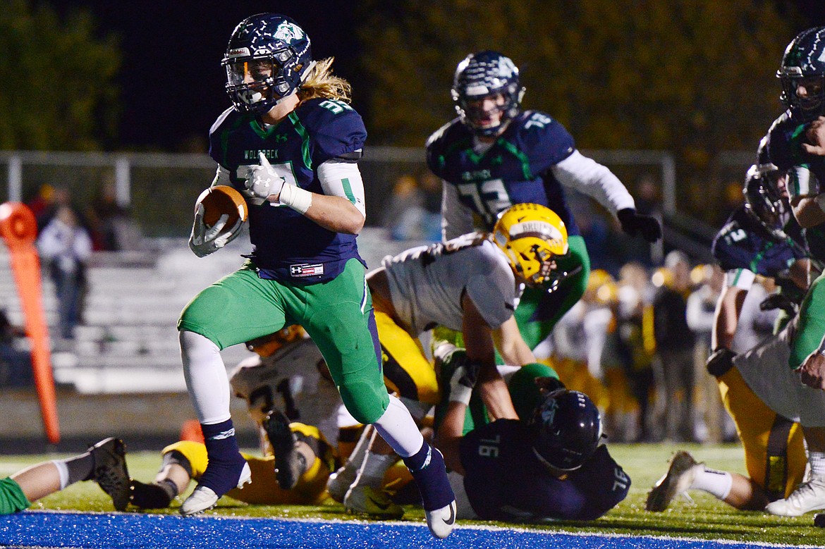 Glacier running back Preston Blain (33) scores a second-quarter touchdown against Helena Capital at Legends Stadium on Friday. (Casey Kreider/Daily Inter Lake)