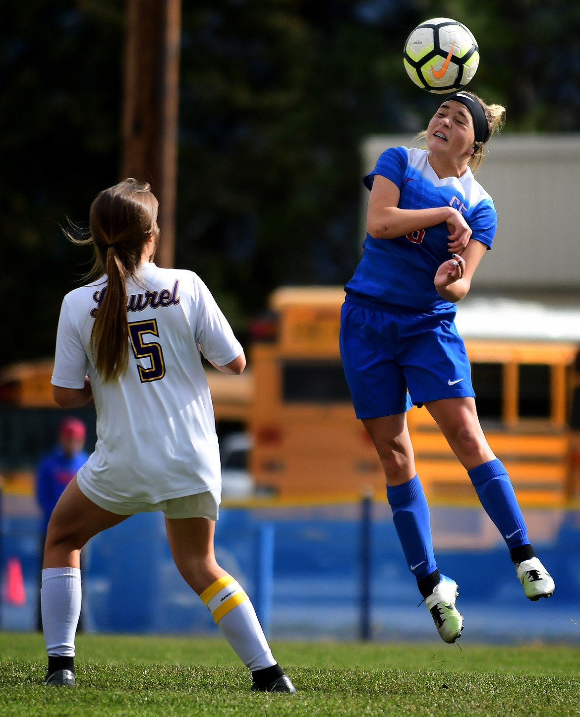 Alexis Green heads the ball past Laurel&#146;s Aspen Cotter Saturday. (Jeremy Weber photo)