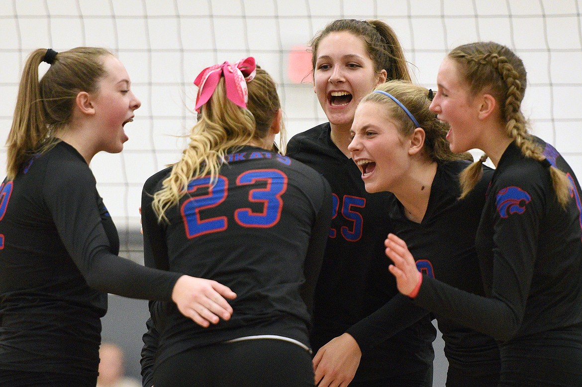 Columbia Falls huddles to celebrate a point against Whitefish at Whitefish High School on Thursday. (Casey Kreider/Daily Inter Lake)