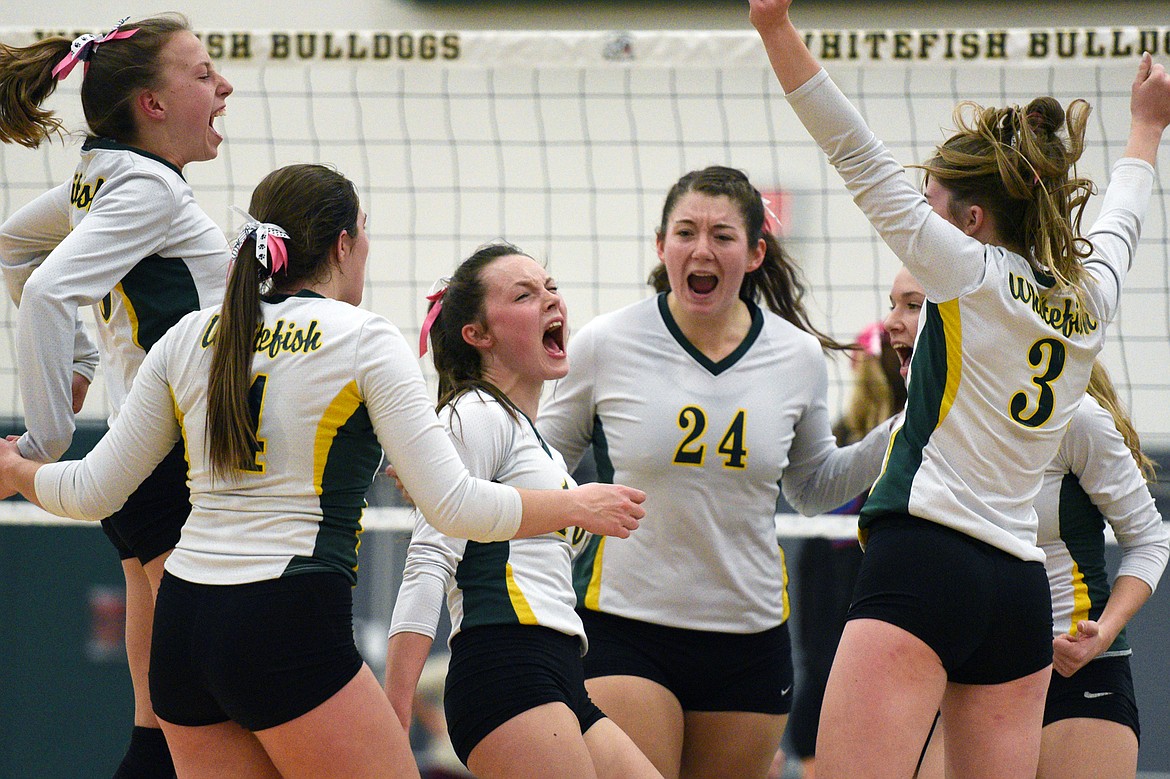 Whitefish huddles to celebrate a point against Columbia Falls at Whitefish High School on Thursday. (Casey Kreider/Daily Inter Lake)