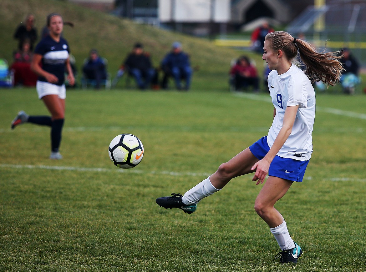 Coeur d'Alene's Zoe Cox dribbles the soccer ball in Tuesday's Region 1 girls championship game at Lake City High School. (LOREN BENOIT/Press)