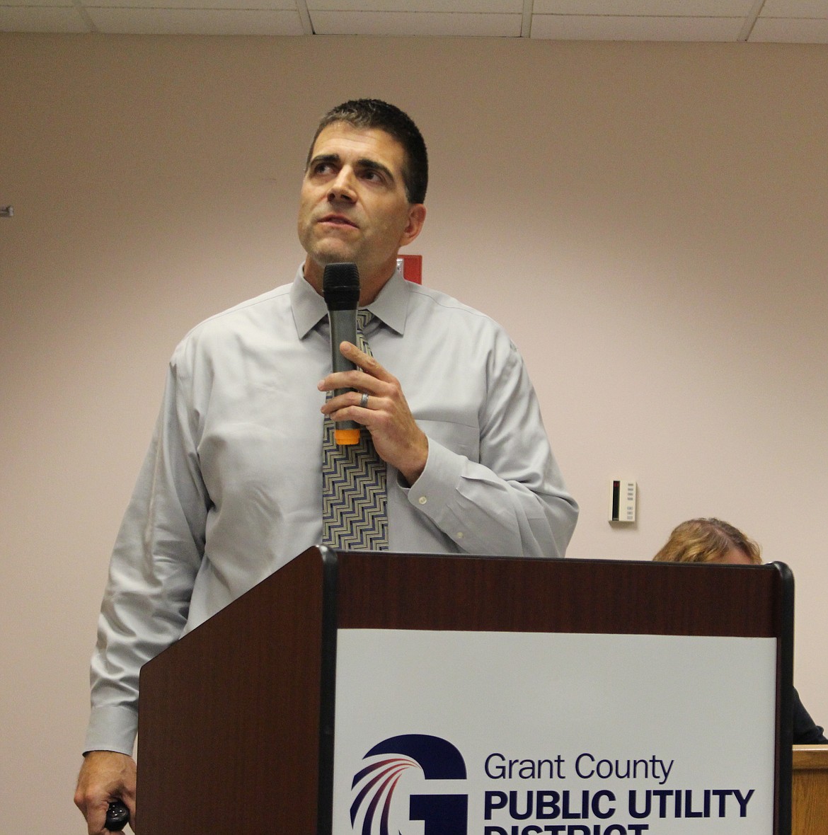 Cheryl Schweizer/Sun Tribune - Chief financial officer Jeff Bishop explained some of the details of the Grant County PUDs 2019 budget during a public hearing.