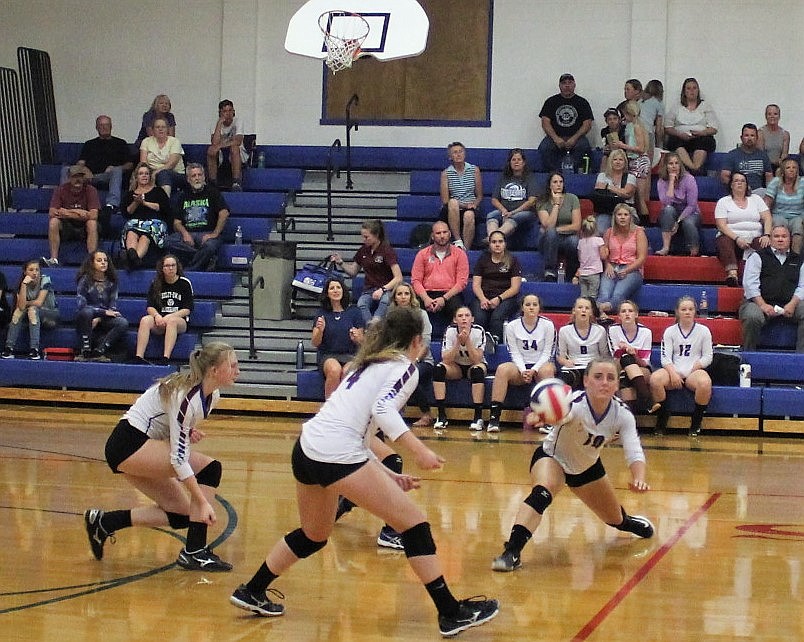 The Clark Fork Lady Mountain Cats clawed their way to victory over Valley Christian on Oct. 4. Margaret Parkin (10) stretches for the ball. She earned 13 of her teams&#146;s 47 digs during the match against the Eagles. (Kathleen Woodford/Mineral Independent)