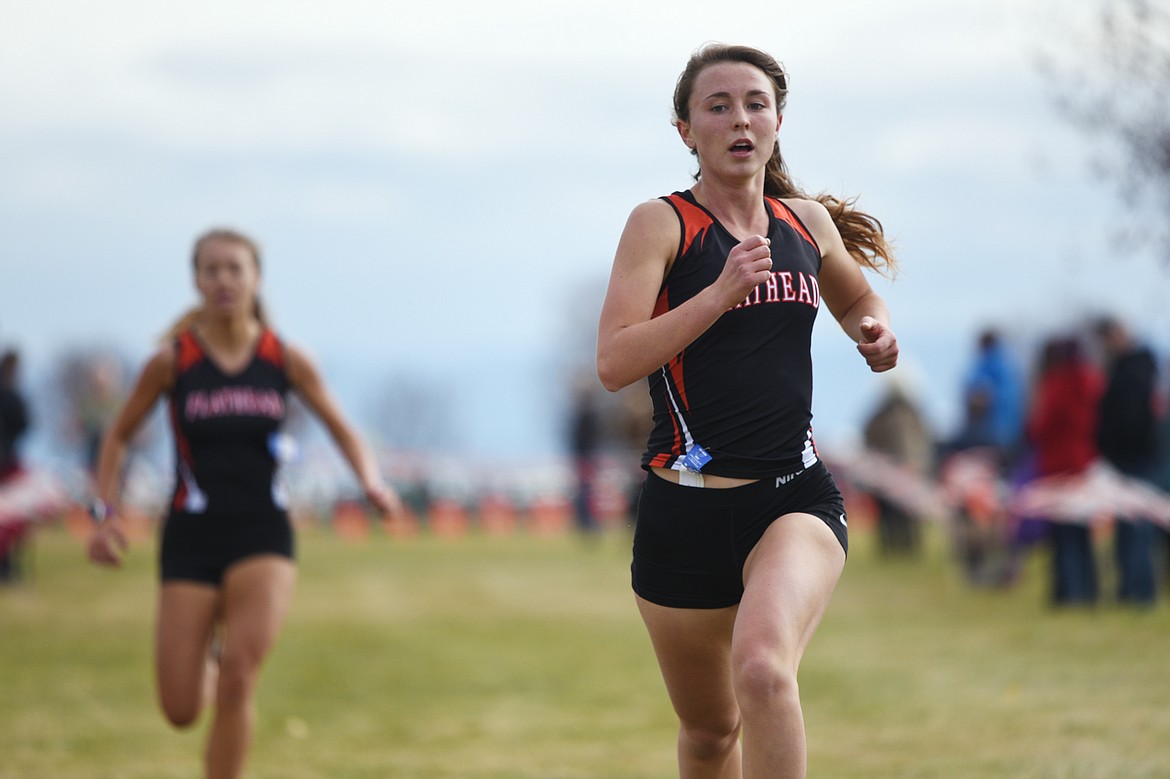 Flathead's Sadie Wilson crosses the finish line in second place at the Glacier Invitational cross-country race at Rebecca Farm on Wednesday. (Casey Kreider/Daily Inter Lake)