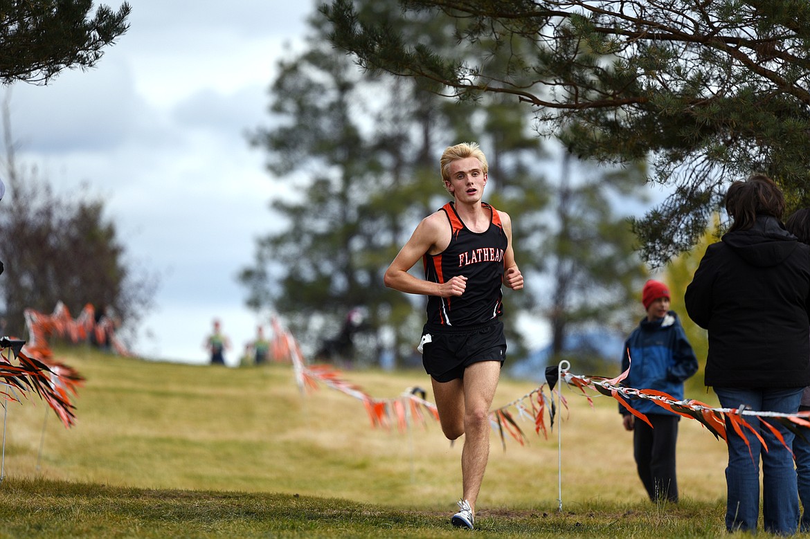 Flathead's Ben Perrin distances the pack at the Glacier Invitational cross-country race at Rebecca Farm on Wednesday. (Casey Kreider/Daily Inter Lake)