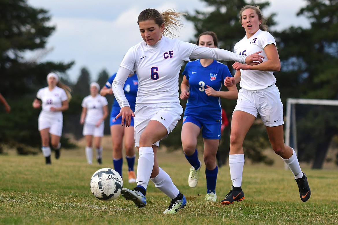 Alexis Green moves the ball ahead during the Wildkats 3-0 win over the Valkyries in Bigfork Thursday. (Jeremy Weber photo)