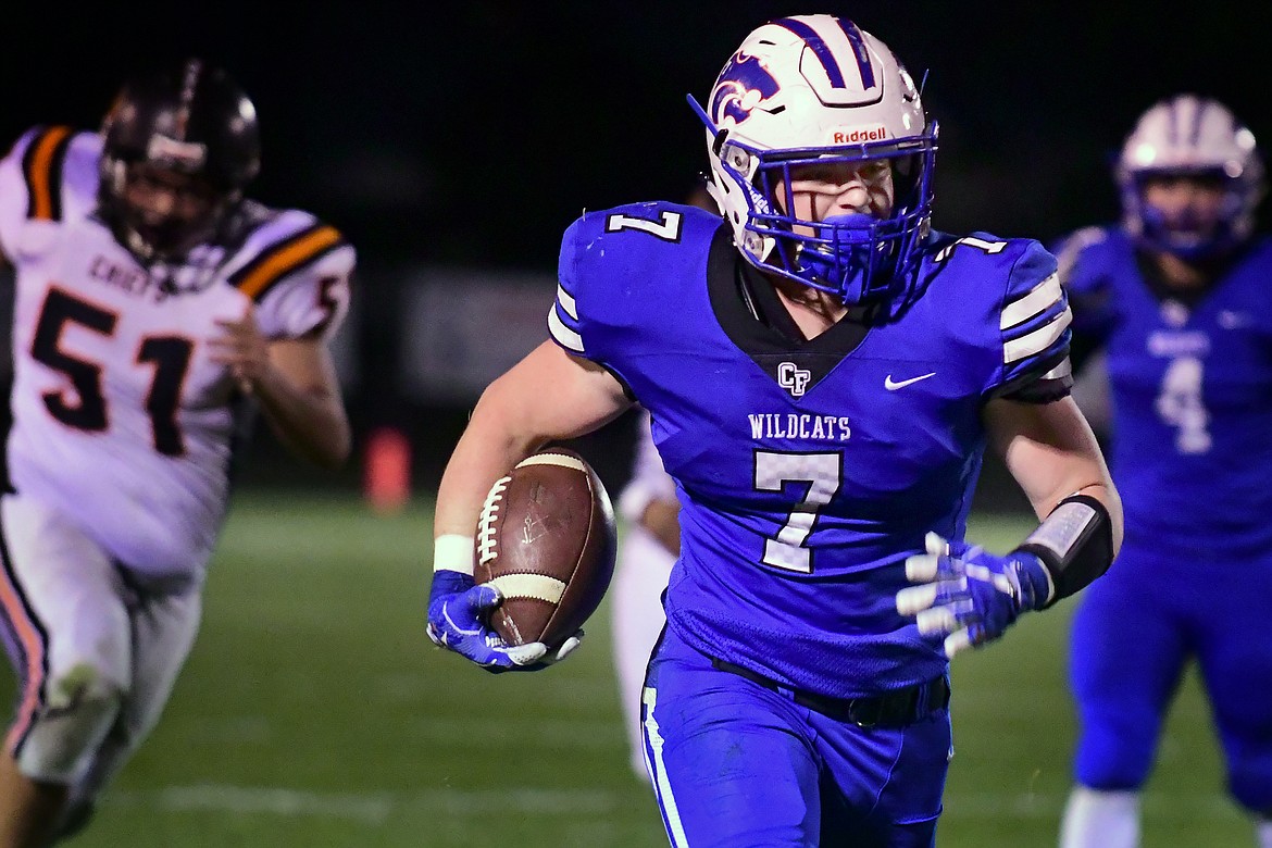 Colten McPhee finds room to run in the second quarter against Ronan Friday. McPhee finished with 265 rushing yards as the Wildcats downed the Chiefs, 64-7. (Jeremy Weber photo)