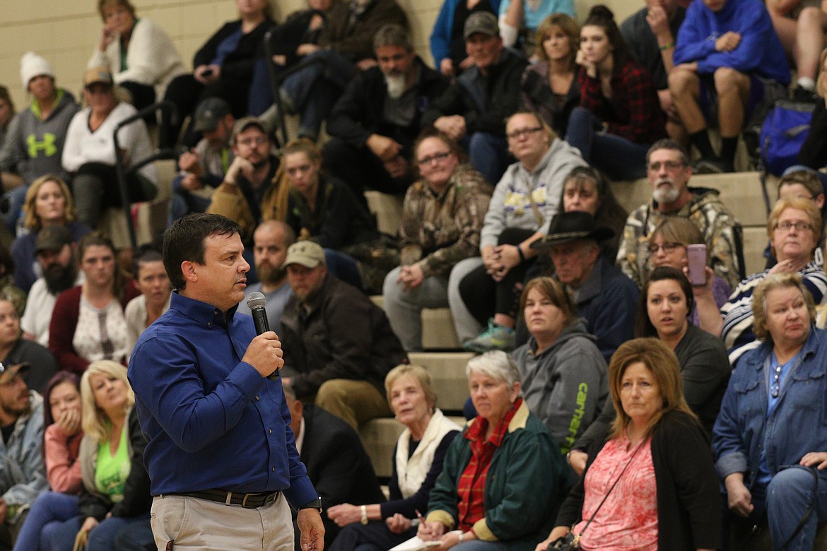 Libby School Superintendent Craig Barringer addresses parents and other concerned citizens at a meeting held Tuesday evening to discuss the response to threatening messages discovered late last week at Libby Middle/High School. (John Blodgett/The Western News)