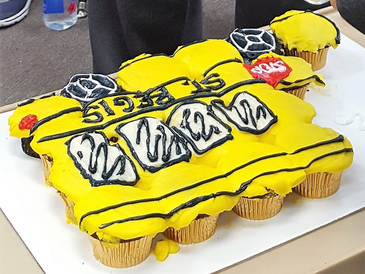 Bus driver, Bernie Patterson retired after 43 years of working at St. Regis School earlier this month as a teacher, administrator, and assistant transportation director. His daughter Emma, made him a special bus cake for the occasion. (Photo provided by St. Regis School).