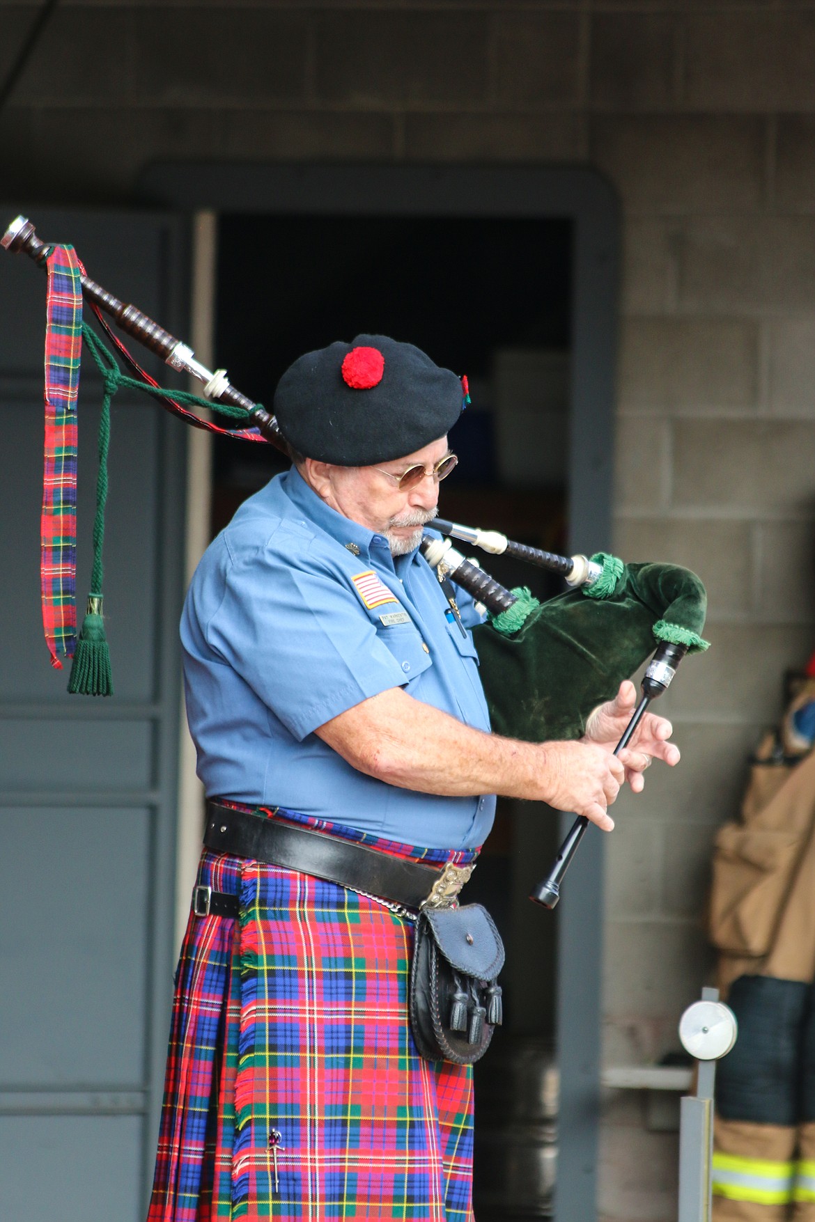 Photo by MANDI BATEMAN
Bonners Ferry Firefighter Pat Warkentin played &#147;Amazing Grace&#148; on the bagpipes followed by &#147;Going Home.&#148;