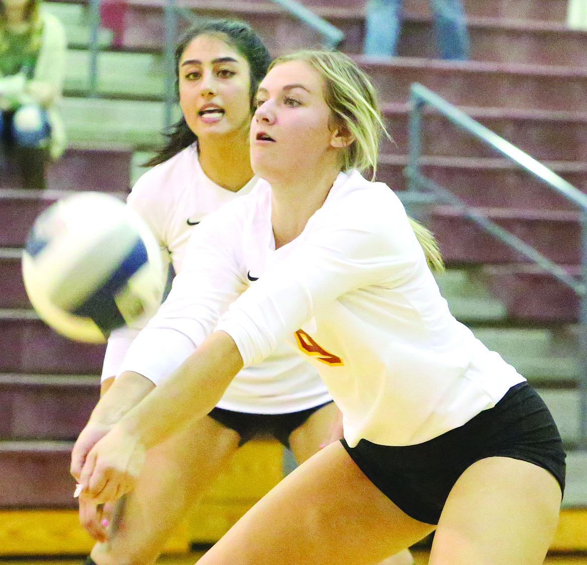 Connor Vanderweyst/Columbia Basin Herald
Moses Lake outside hitter Ashlyn Haneberg receives a serve from Eastmont.