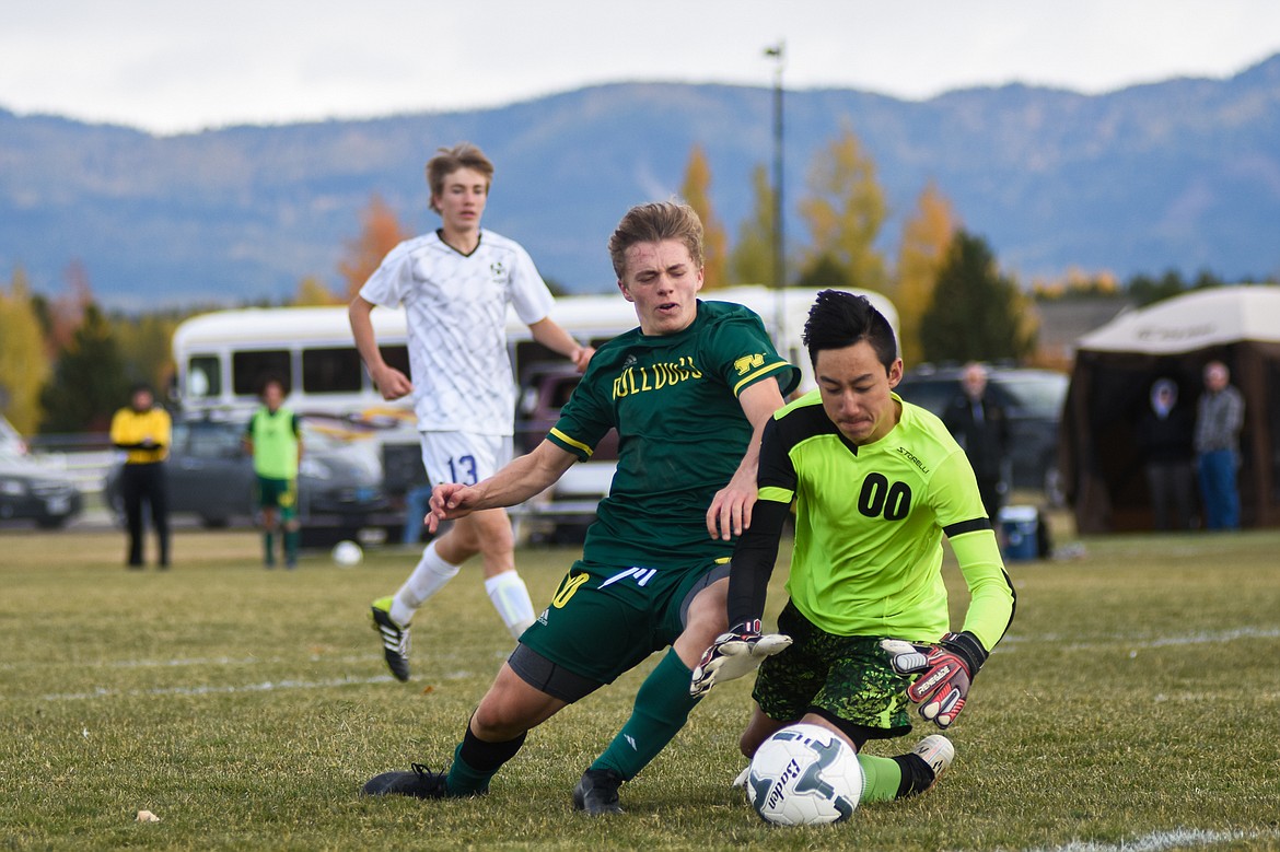 Casey Schneider tries to beat the keeper in Saturday's quarterfinal match against Livingston-Park.