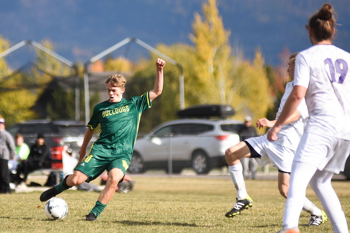 Casey Schneider makes a move in Saturday's quarterfinal match against Livingston-Park.