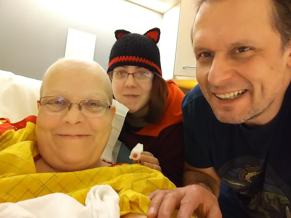 In February 2018, Corey Brock had a double mastectomy. Here, she is pictured with her daughter, Courtney, and boyfriend, Ralph, both of whom have been Brock&#146;s caregivers. (Photo provided)