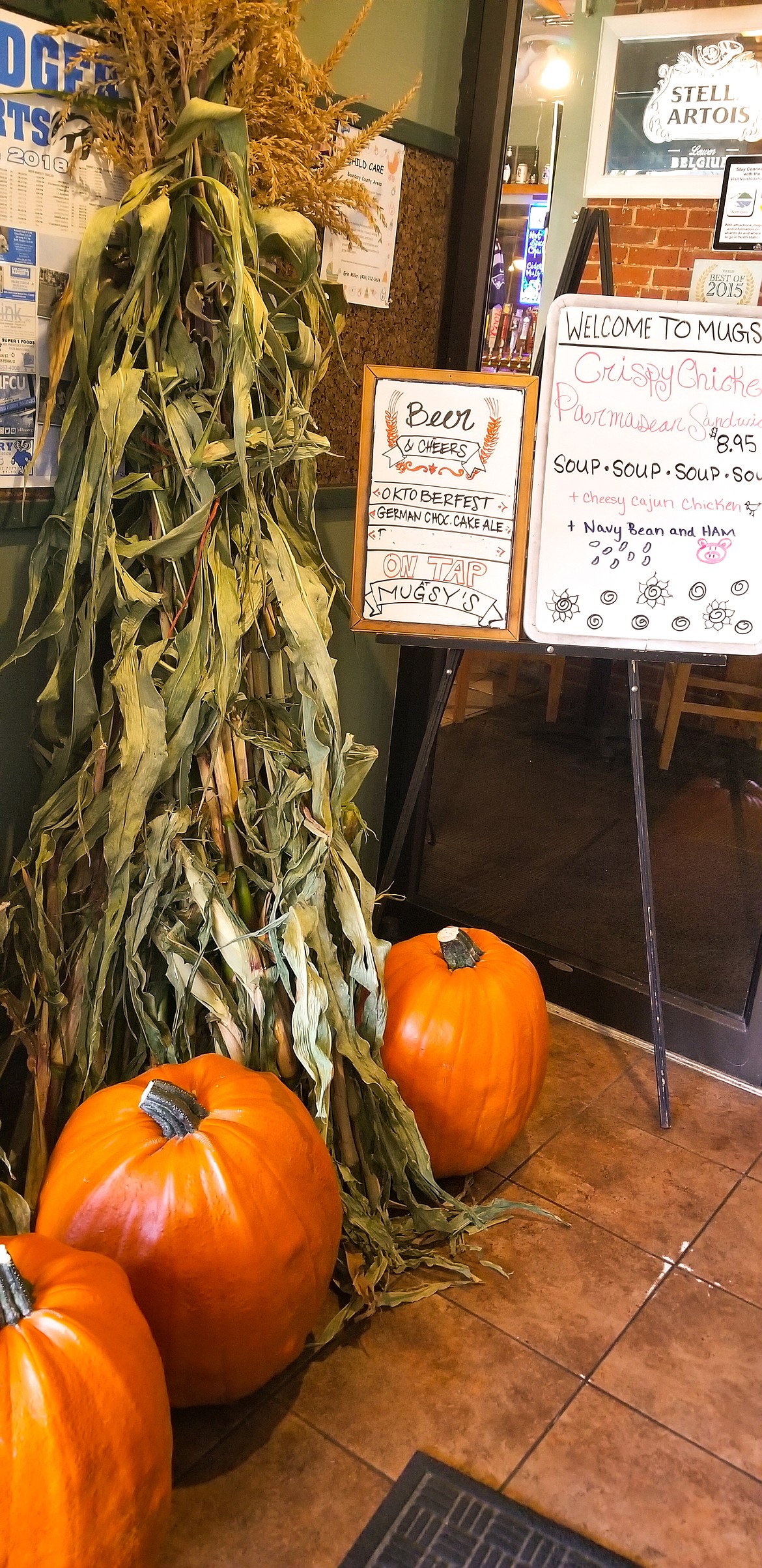 Photo by MANDI BATEMAN
Patrons to local businesses may see the Corn Man&#146;s cork stalks and pumpkins decorating the entryways.