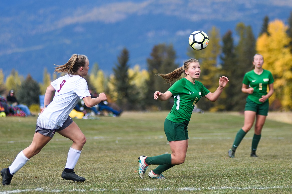 Josie Schneider aims a header in Saturday's quarterfinal match at Smith Fields.