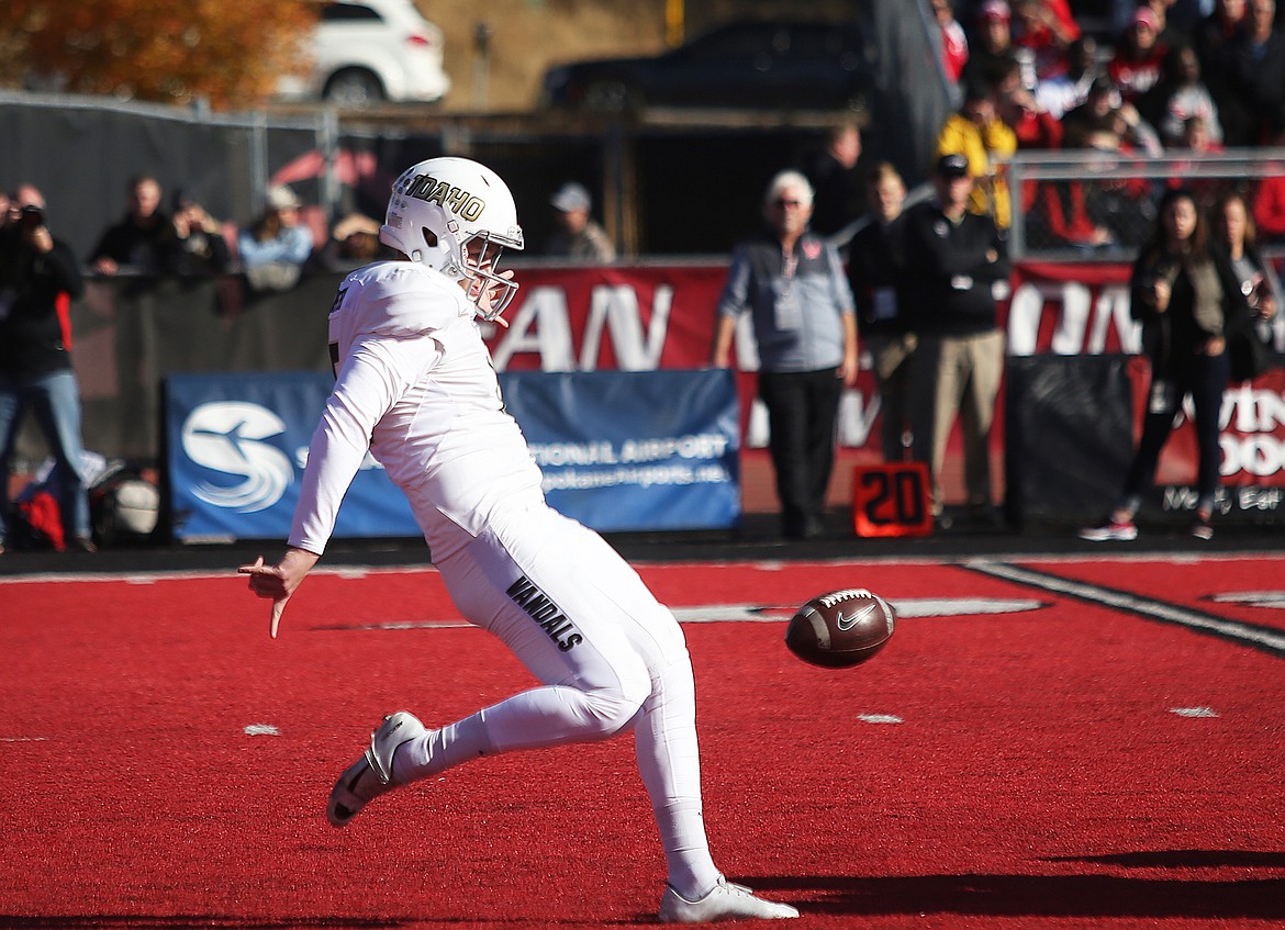University of Idaho's Cade Coffee punts the ball downfield during Saturday's game in Cheney. (LOREN BENOIT/Press)