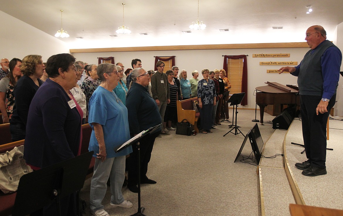 DEVIN WEEKS/Press
Chorale Coeur d&#146;Alene artistic director and conductor Stan McDaniel leads his singers in vocal warm-ups at the beginning of rehearsal Sept. 18 at Peace Lutheran Church on the edge of Post Falls. The choir, a nonprofit group with about 80 active members, formed in 2001. The Chorale&#146;s 2018-2019 fall and winter season will begin with the &#147;Made in the USA&#148; concert Nov. 9 at Trinity Lutheran Church in Coeur d&#146;Alene.