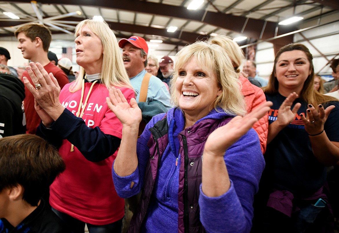 Dawna Carlon and Beth Gilman, both of Kalispell, cheer during the Montana Victory Tour on Saturday morning, October 27, at the Expo Building at the Flathead County Fairgrounds.(Brenda Ahearn/Daily Inter Lake)