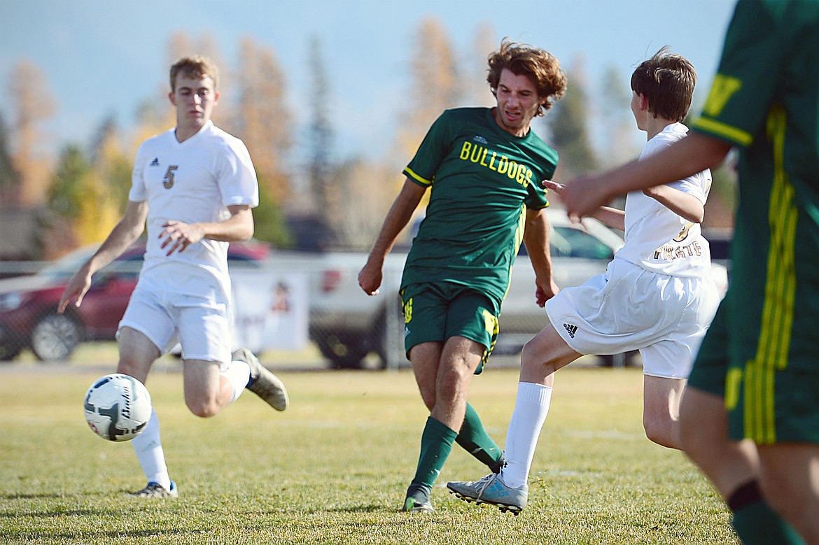 Whitefish's Xander Burger (16) scores his second of five goals in the Class A state soccer championship against Polson at Smith Fields in Whitefish on Saturday. Whitefish won, 6-2. (Casey Kreider/Daily Inter Lake)