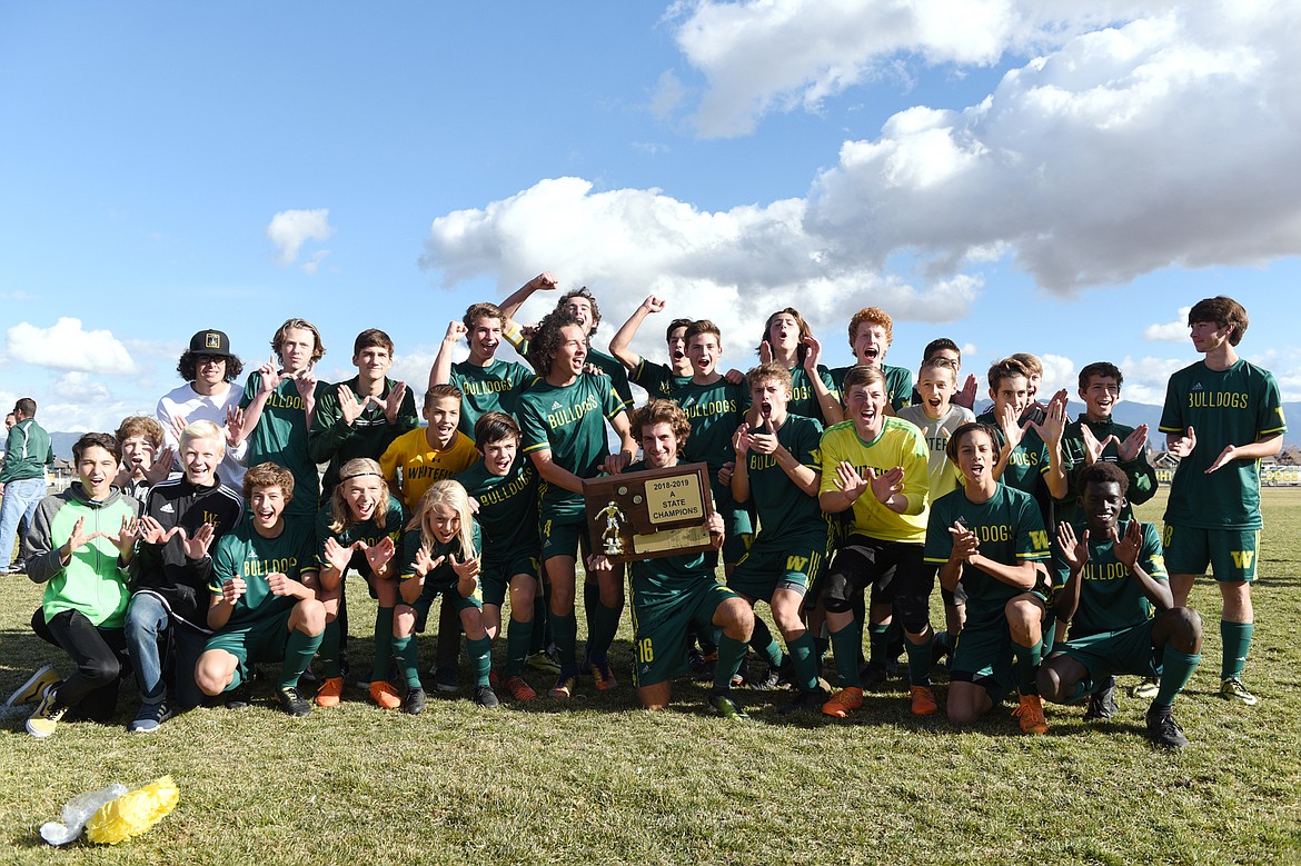 Whitefish celebrates after its 6-2 victory over Polson in the Class A state soccer championship at Smith Fields in Whitefish on Saturday. (Casey Kreider/Daily Inter Lake)