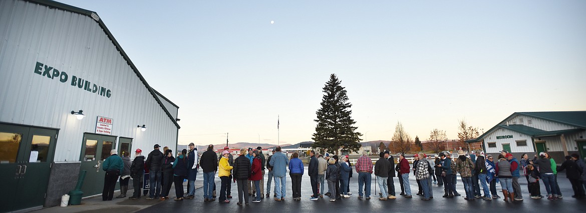 A long line outside the Expo Building at the Flathead County Fairgrounds before the start of the Montana Victory Tour on Saturday morning, October 27, at the Expo Building at the Flathead County Fairgrounds.(Brenda Ahearn/Daily Inter Lake)