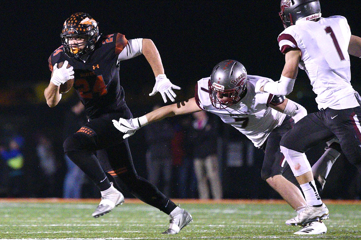 Flathead running back Blake Counts (24) looks for room to run against Helena at Legends Stadium on Friday. (Casey Kreider/Daily Inter Lake)