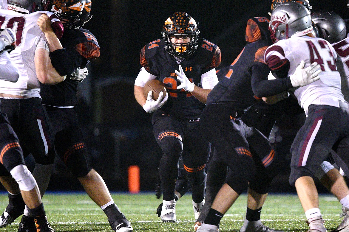 Flathead running back Blake Counts (24) looks for room to run in the second quarter against Helena at Legends Stadium on Friday. (Casey Kreider/Daily Inter Lake)