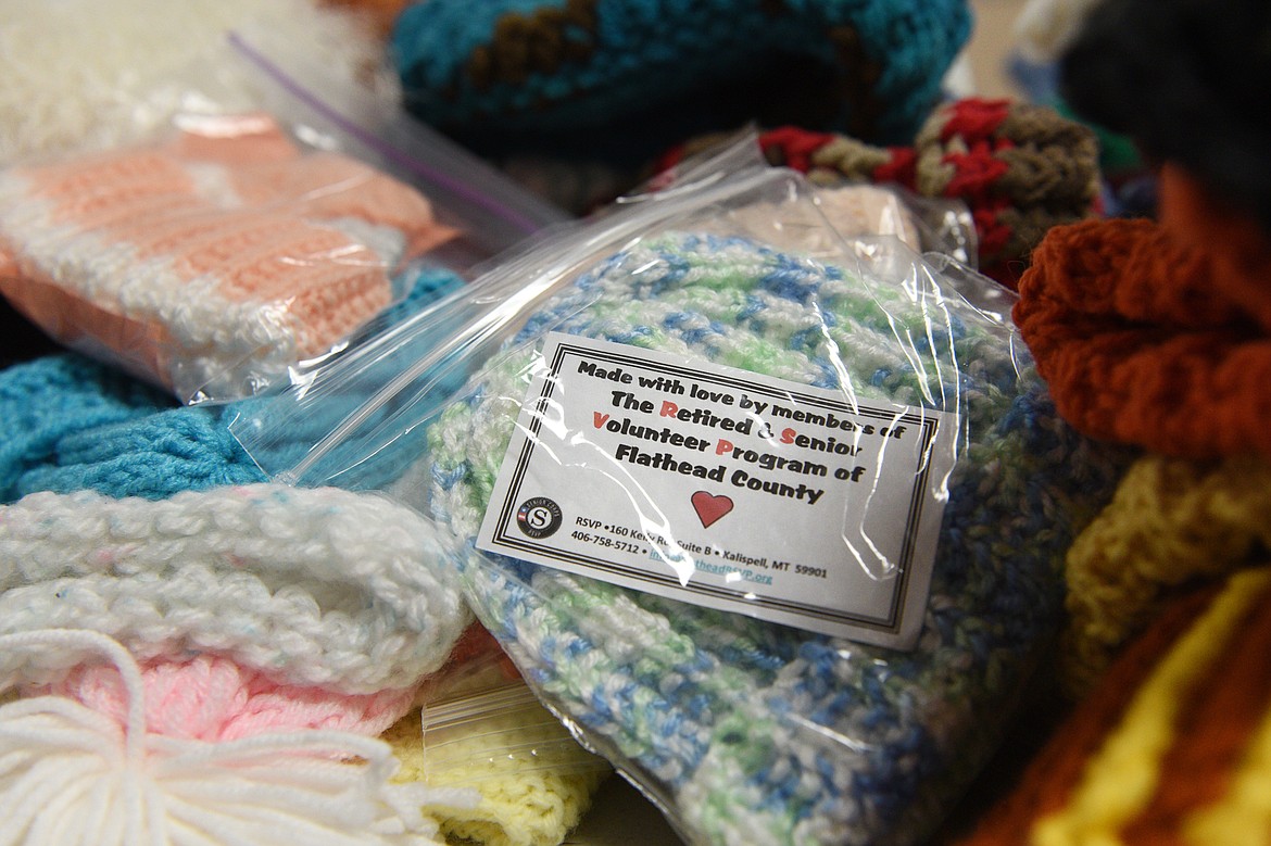 Donated items are organized on a table for the Kalispell Senior Center&#146;s winter clothing drive.