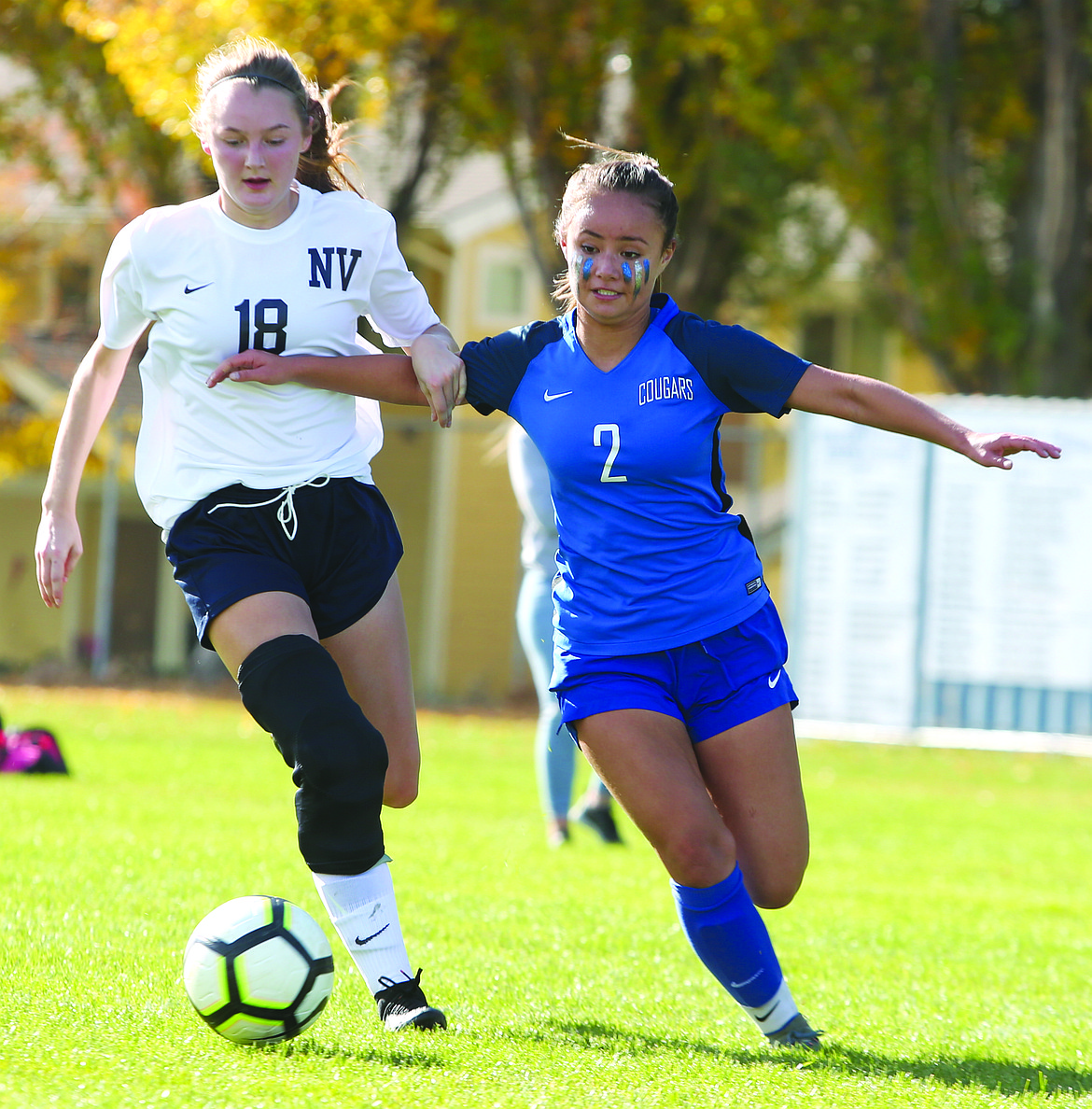 Connor Vanderweyst/Columbia Basin Herald
Warden midfielder Ashlyn Yamane (2) jostles for possession with Naches Valley midfielder Fransico Lopez.