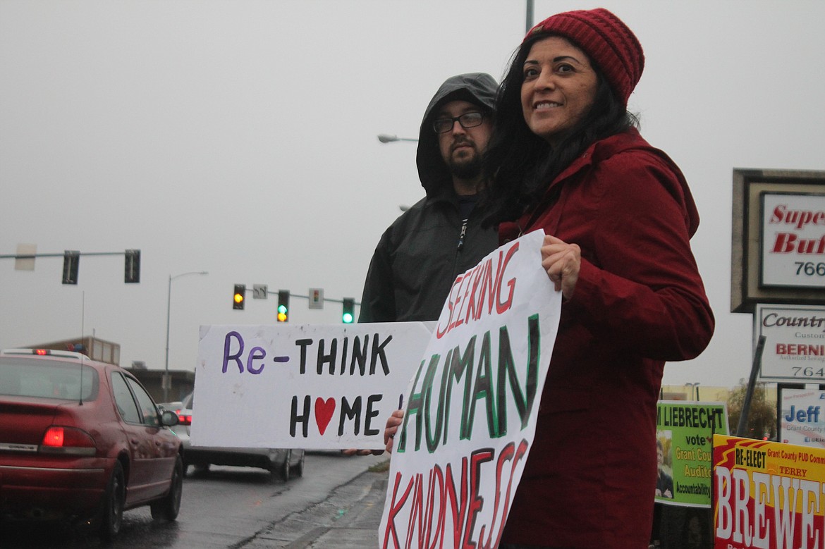Richard Byrd/Columbia Basin Herald
A little bit of rain on Thursday couldnt dampen the spirits of the volunteers at the annual Sleep on the Street event on Stratford Road in Moses Lake. Look for a full report in Mondays Herald.