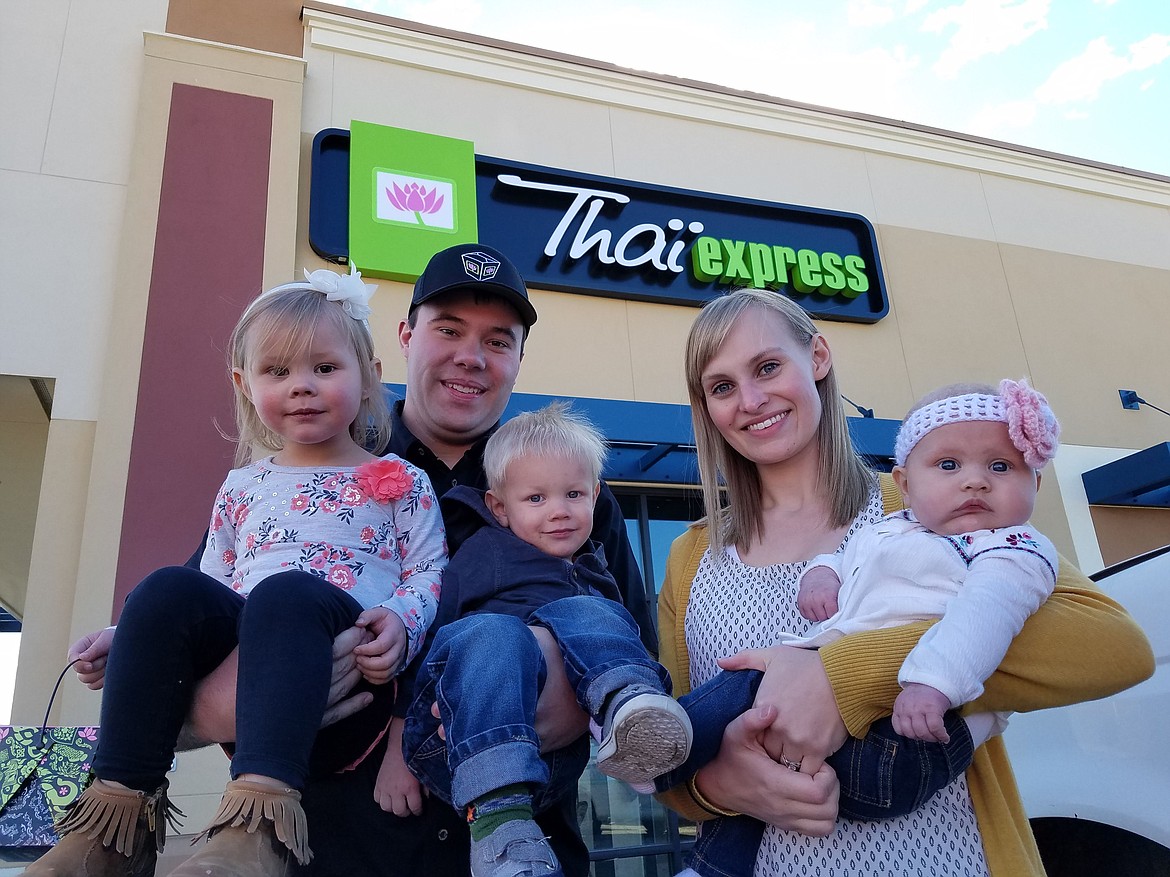 Courtesy photo
The Rhoads family, from left: Ainsley (3), Jordan, Rader (1&frac12;), TeAnn, Ina (4 months) stands in front of the new Thai Express restaurant, which opens this week in the Crossroads Shopping Center off Ramsey Road in Coeur d&#146;Alene.