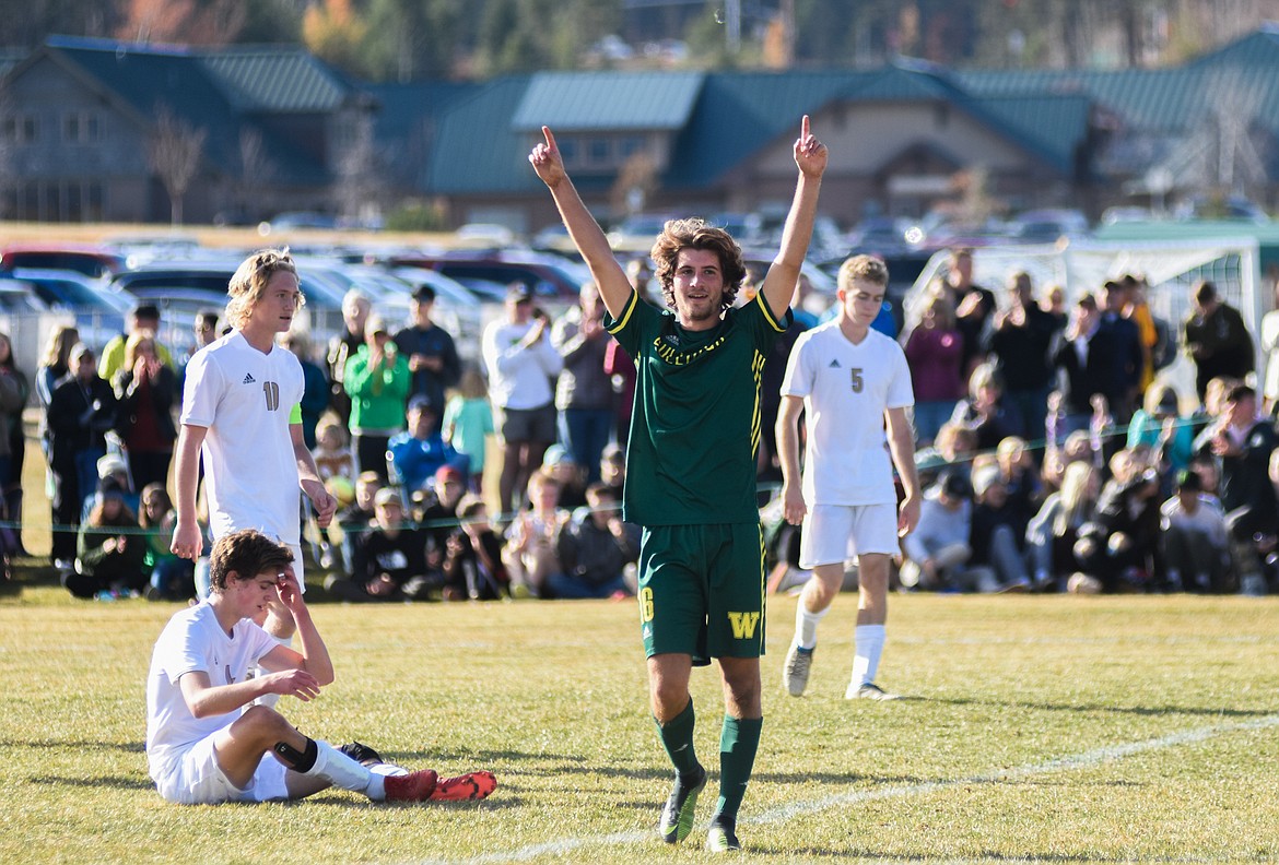 Xander Burger celebrates as time expires in the Bulldogs' 6-2 Class A State Championship victory over Polson.