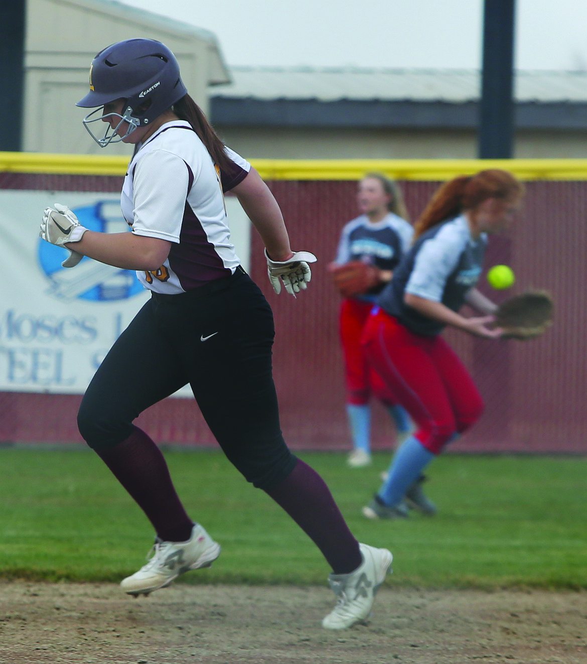 Connor Vanderweyst/Columbia Basin Herald
Moses Lake's Harley Raymond rounds the bases after hitting a home run off the scoreboard in the third inning against West Valley.