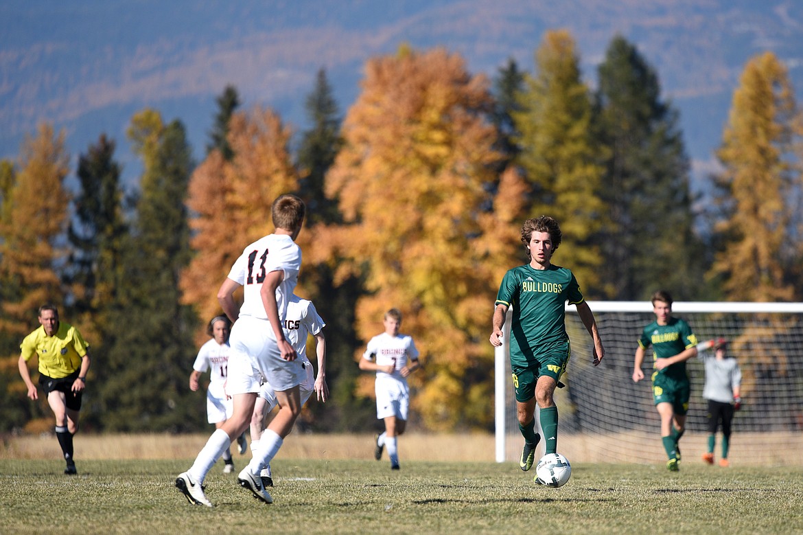 Whitefish's Xander Burger (16) pushes the ball upfield in the second half against Frenchtown at Smith Fields in Whitefish on Saturday. (Casey Kreider/Daily Inter Lake)