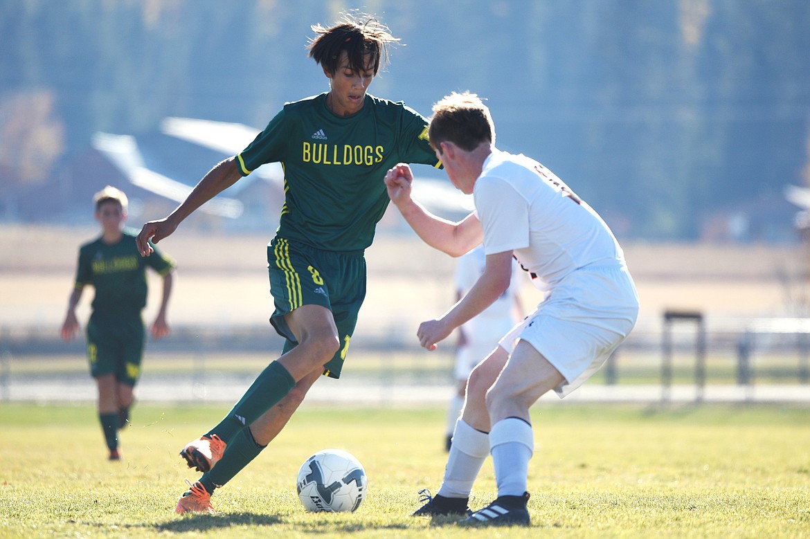 Whitefish's Brandon Mendoza (8) works the ball upfield against Frenchtown at Smith Fields in Whitefish on Saturday. (Casey Kreider/Daily Inter Lake)