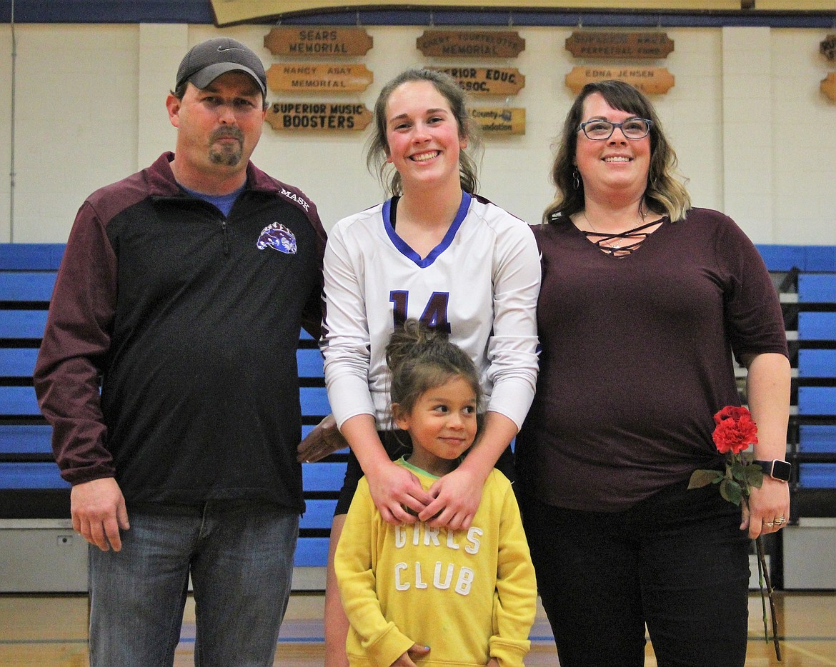 Superior&#146;S Madison Mask was escorted by her parents, Jeff and Kristy Mask during Senior Night on Oct. 20. (Photo courtesy of Frankie Kelly)