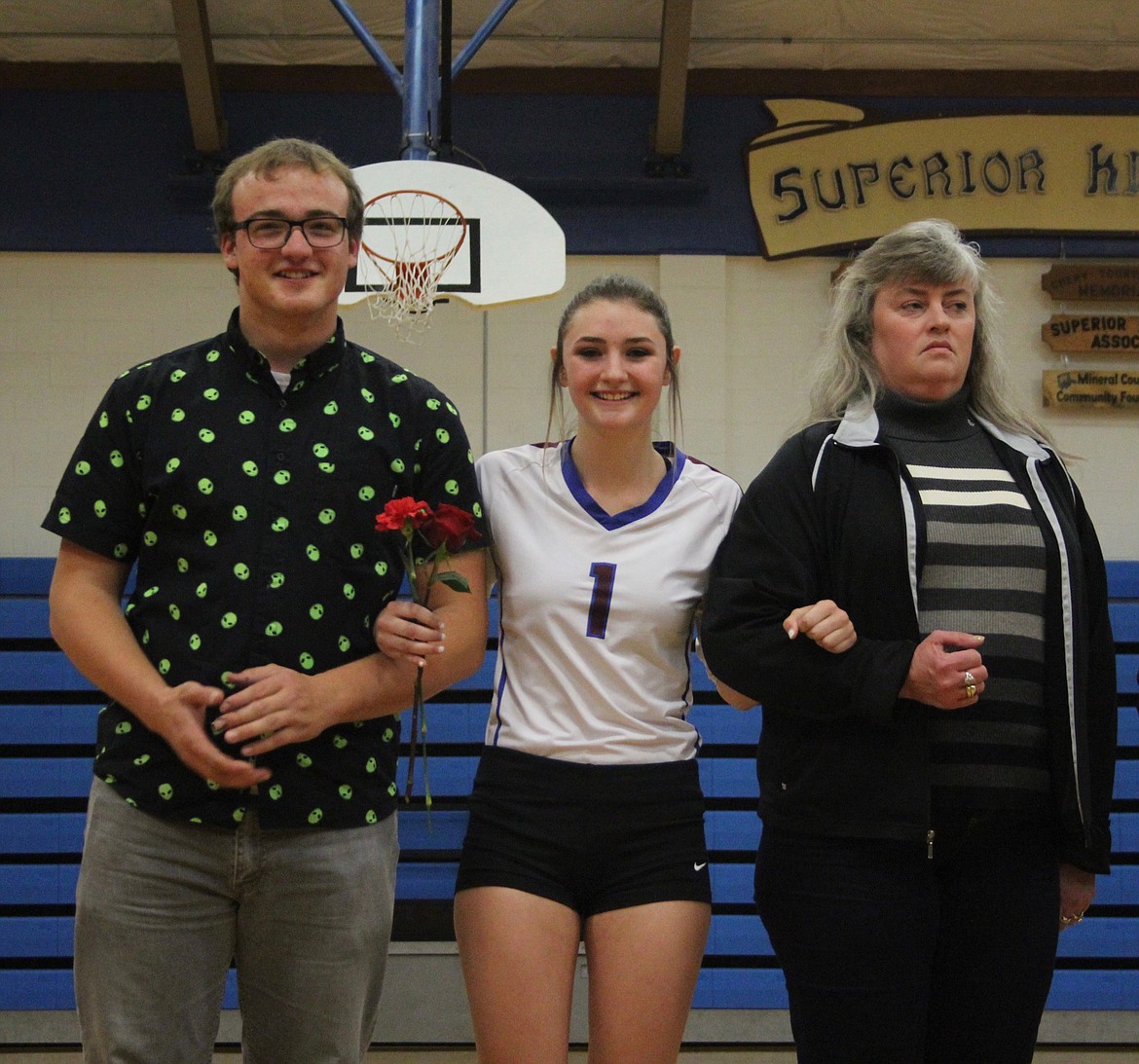 Alberton senior Kristina Solinger was escorted by her brother, Jordan, and mother, Melinda Taapken during Senior Night in Superior on Oct. 20. (Photo courtesy of Frankie Kelly)