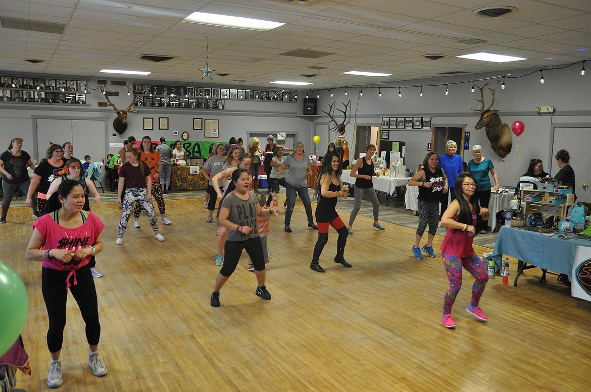 People fill the Elks Lodge dance floor Saturday during a Zumba-thon benefitting Life Savers Animal Rescue. (Ashley Fox/Lake County Leader)