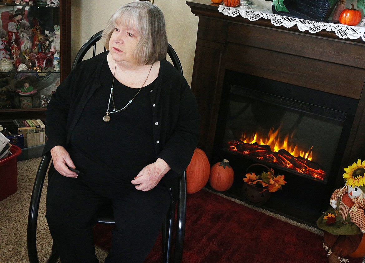 Barbara Norgol purchased her electric fireplace from Wayfair about two years ago and noticed the spooky shadow effect of dangling feet and hands on day one. She invited The Press to see these eerie images on Tuesday after realizing this would make an interesting Halloween story. (LOREN BENOIT/Press)