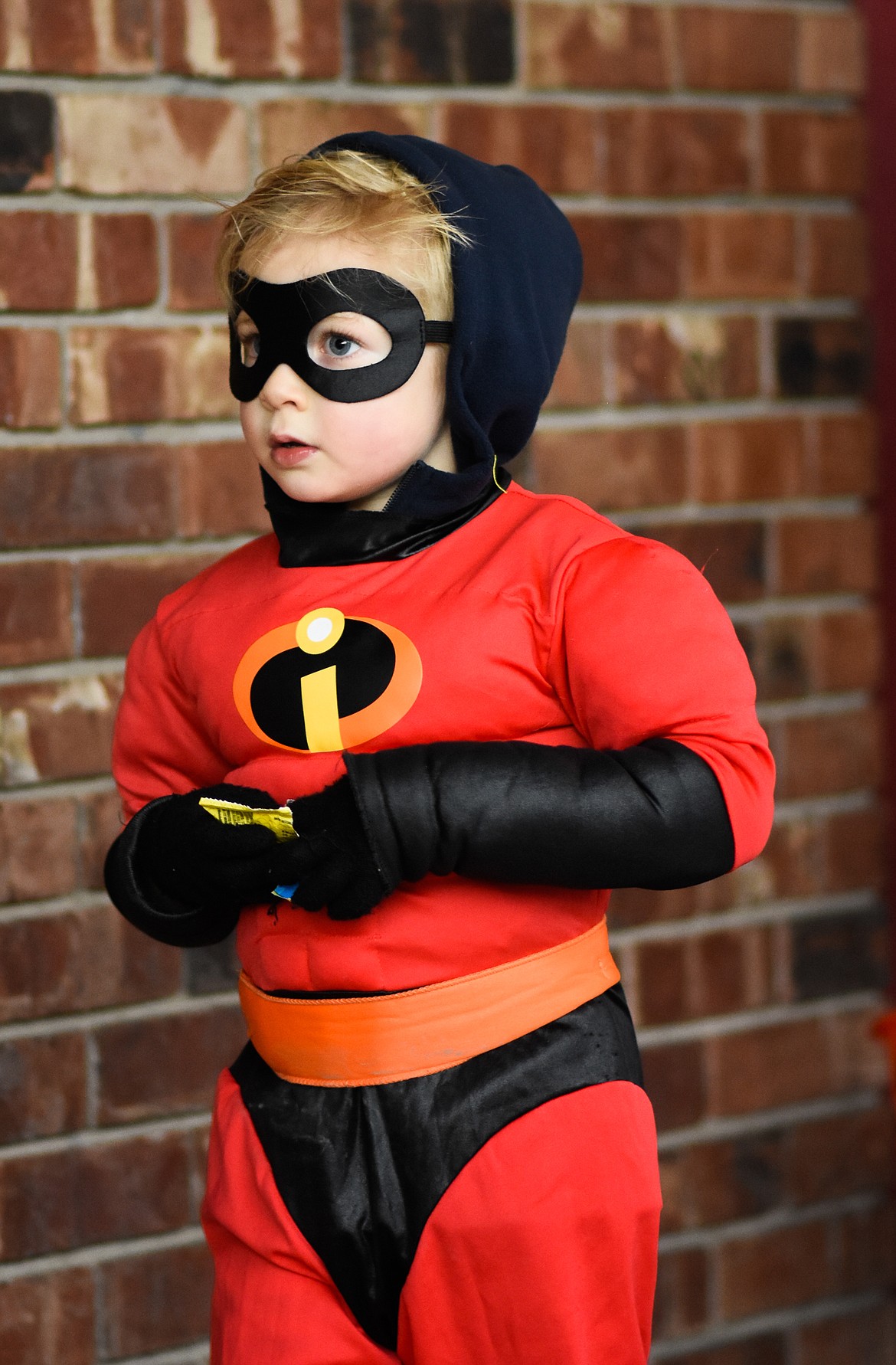 Mr. Incredible flexes his muscles in downtown Whitefish during Halloween Wednesday. (Daniel McKay/Whitefish Pilot)